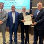 الطالبة وسن السيد قائدة مرشدات فلسطين في المخيم الكشفي العالمي (Jamboree)